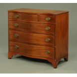 A George III mahogany serpentine fronted chest of drawers,