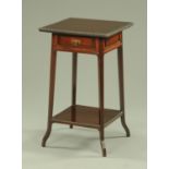 A mahogany Arts & Crafts square occasional table, fitted with a single drawer and with low shelf.