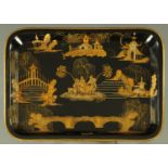 A good 19th century chinoiserie decorated papier mache and lacquered tray,