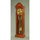 A walnut cased longcase clock,