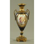 A late 19th century Sevres style porcelain urn, with metal mounts, handpainted, signed "Hazel".