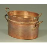 A large 19th century copper fish kettle, oval, with four carrying handles. Height 31 cm.