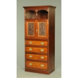 A late Victorian cupboard and combined chest of drawers, the centre section from a wardrobe,