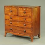 An early 19th century mahogany North Country secretaire chest of drawers,