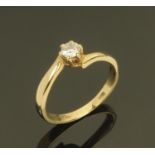 A ladies 9 ct gold dress ring set with solitaire paste stone, ring size M/N.