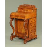 A 19th century walnut Davenport,