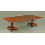 A late Regency/William IV mahogany dining table, comprising two ends and two leaves,