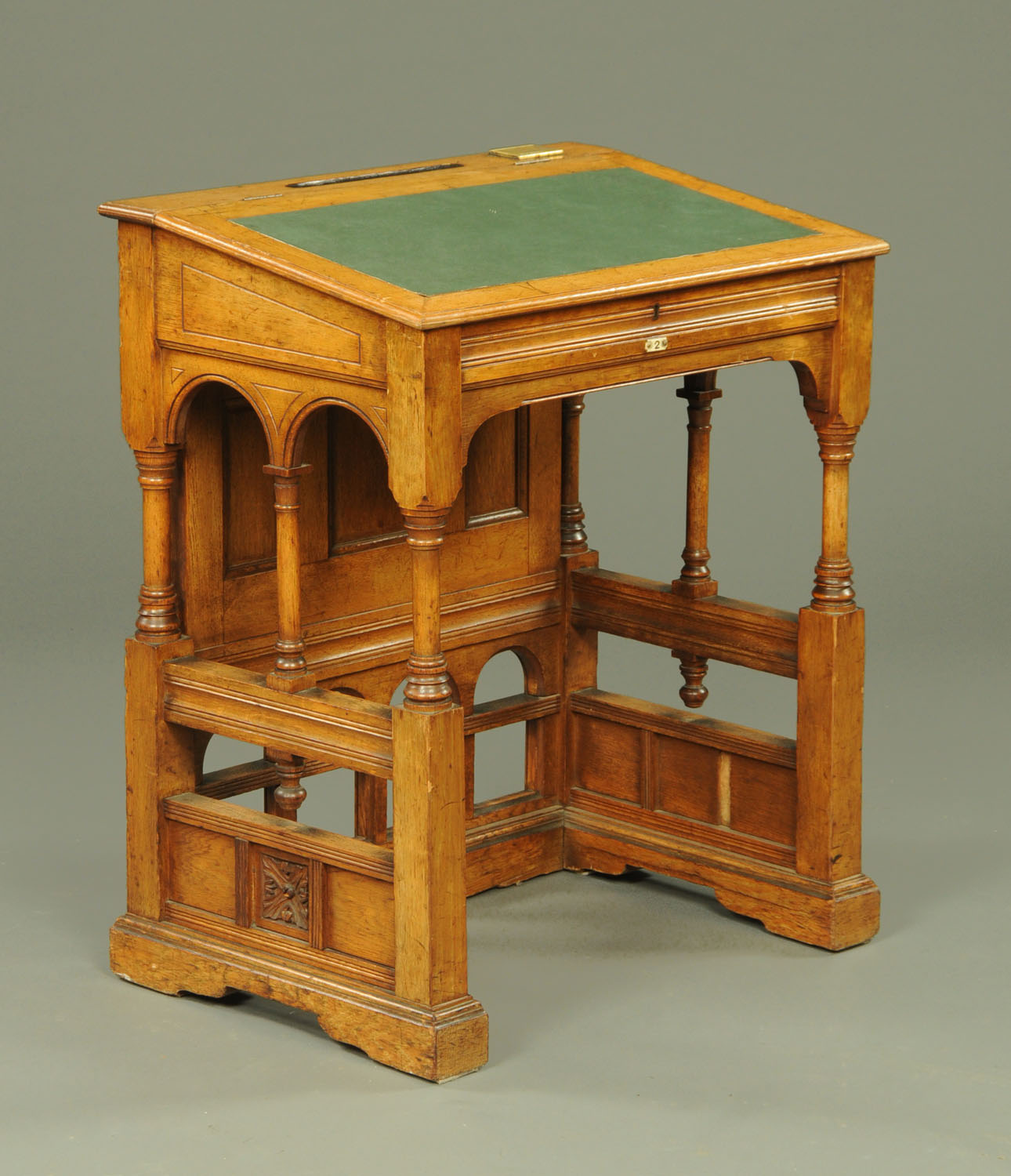 Attributed to Gillows of Lancaster, for Kendal Town Council meeting room, a golden oak writing desk,