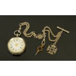 A Continental silver cased fob watch, with enamelled dial with gilt heightened centre and border,