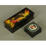 Two Russian lacquered hinged boxes, largest depicting a phoenix, length 16 cm.