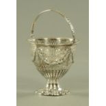 A Victorian silver basket, Roberts and Belk, Sheffield 1869, having a bellflower decorated handle,