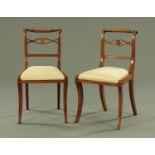 A pair of Regency mahogany dining chairs, with rope twist top rail,