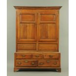 A George II oak cupboard on chest,