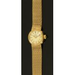 A ladies 9 ct gold Omega wristwatch, the dial with baton markers,