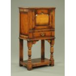 A Titchmarsh and Goodwin drinks cabinet, (model number RL19121),