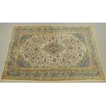 A large Persian design rug, 20th century,