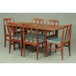 A 1960's mahogany dining table and six chairs by Younger, Model Fonseca in afromosia.