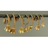 Seven 19th century gilt brass Country House butler's bells.