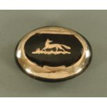 A 19th century tortoiseshell and gold metal mounted snuffbox, of oval form,