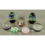 Seven assorted 20th century glass paperweights,