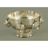 A silver plate on copper punch bowl, with gadrooned rim,