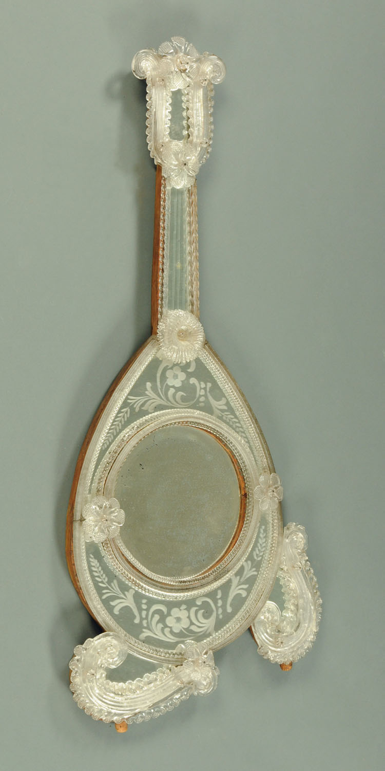 A 19th century Venetian glass mirror, in the shape of a mandolin, with old inventory label to rear.