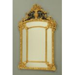 A reproduction gilt framed mirror,