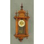 A late Victorian Vienna style regulator wall clock, with two-train striking movement.