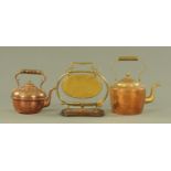 Two brass and copper kettles,