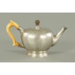 A Victorian silver bullet shaped teapot, Frederick Brasted, London 1885,