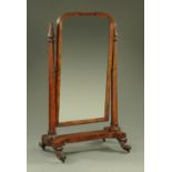 A William IV mahogany cheval mirror, of large form, with moulded frame,