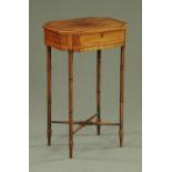 An early 19th century mahogany worktable, with crossbanded edge,