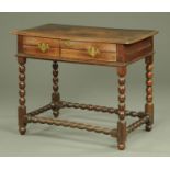 An antique oak side table, with moulded edge and frieze drawer,