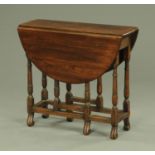 An 18th century and later drop leaf table, of small proportions,