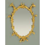A Georgian carved giltwood framed mirror, in the rococo style.