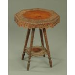 An Eastern carved hardwood octagonal occasional table,