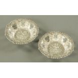 A pair of Victorian silver bonbon dishes, repousse with winged cherubs, Birmingham 1898,