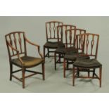 A set of five George III mahogany dining chairs, one carver and four singles,