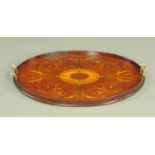 An Edwardian mahogany and inlaid oval drinks tray,