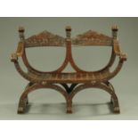 A late 19th/early 20th century double chair back Klismos type bench seat,