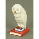 A large Herend porcelain owl, standing on a stack of two books, factory printed marks,