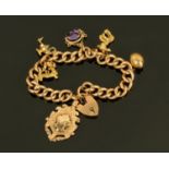 A 9 ct gold hollow link charm bracelet, with heart shaped padlock clasp,