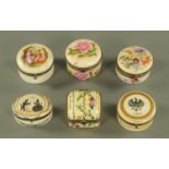 Six Continental porcelain trinket boxes, decorated with flowers or figures.