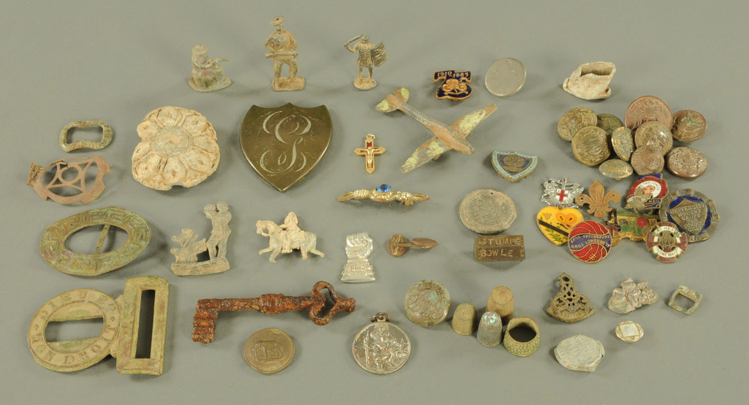 A collection of miscellaneous metal detector finds, to include a cast lead paterae,