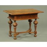 A late Victorian oak side table, with moulded edge and recessed frieze with single drawer,