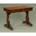 An early 19th century mahogany sofa table,