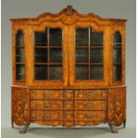 An 18th century Dutch marquetry display cabinet, profusely inlaid throughout with flowers and birds,