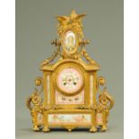 A late 19th century French gilt spelter and Paris porcelain mounted mantle clock,