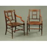 A pair of Victorian mahogany elbow chairs, each with bowed top rail,