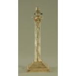 A late 19th century silver plated candlestick, converted to electricity,